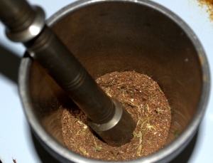 Grinded Indian spices in traditional grider
